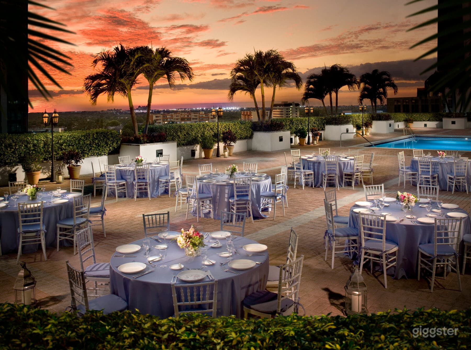 Elegant Poolside Event Terrace with Outdoor Dining